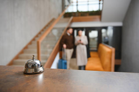Revitup Couple On A Business Trip Doing Check In At The Hotel